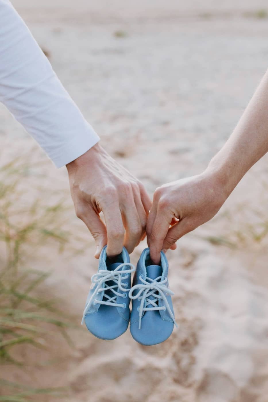A child's small shoes kept as a first-year memory.